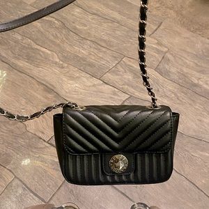 BCBG quilted crossbody with chain link strap.